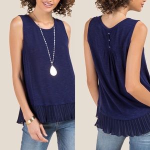 Francesca’s pleated hem blue tank top
